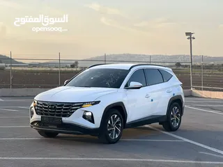  12 هونداي توسان /2022 فل الفل بدون فتحة سقف  2x4 ///240Hp بنزين + كهرباء  ( Haybrid) 1600cc