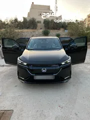  1 Honda E:NS1 E4 electric 2023  هوندا e:ns1 فئة E4 فل اضافات، اسود ميتاليك، داخليه لون ابيض فخمة