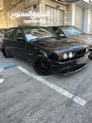  7 E34 BMW   اسود 6 سلندر