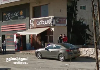  3 بيع محل الاسمر كافية على شارع الرئيسي مباشر