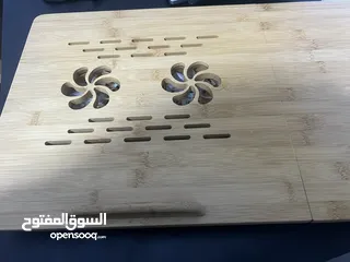  1 طاولة او ستاند لابتوب