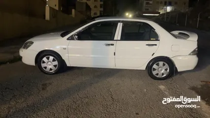  4 ميتسوبيشي لانسر 2013 ماتور 1600 سيارة خالية من اي عيوب بسعر حرق 5000 دينار السعر نهائي