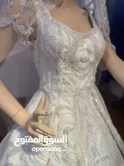  2 فستان زفاف بتفصيل مميزه