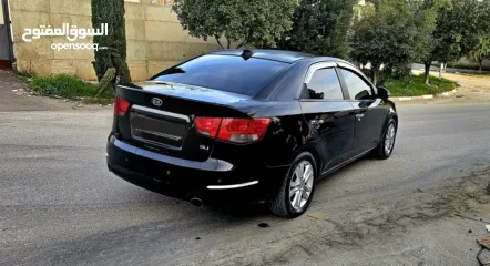  7 كيا فورتي فل مع فتحه سقف وبصمه 2011 اصل برايفت