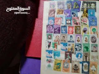  14 نيشان ملكى وزن41, 41 جرام من الدهب والفضه وعقدفضه من الاحجار الكريمه وطوابع قديمه نادره