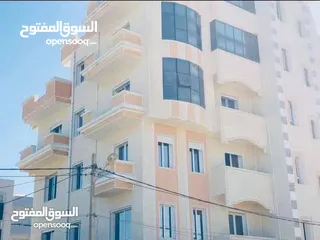  13 عمارة خمس طوابق بأطلاله على شاطئ البحر بثلاث جهات