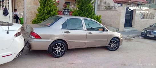  11 ميتسوبيشي لانسر 2003 أوتوماتيك