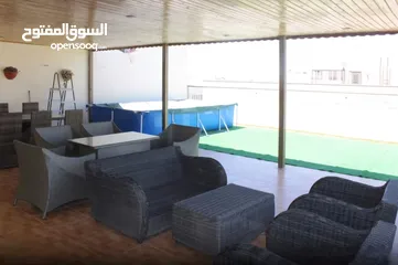  2 شقة مع روف دوبلكس للبيع في حي الصحابة - ref: 14581