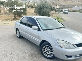  4 ميتسوبيشي لانسر 2007 ماتور 16 اتوماتيك  / وارد الكويت فحص كامل / كاش أو اقساط