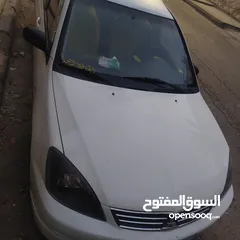  2 ميتسوبيشي لانسر موديل 2013 لون ابيض مرخصه