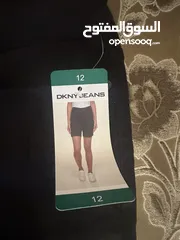  1 شورت DKNY اصلي ميه بالميه