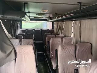  2 باص نقل طلاب باسم مدرسة . نوع افيكو للبيع موديل 2001 مرخص الى شهر 12
