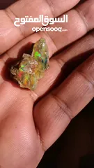  9 حجركريم اوبال ملتي كلر ناري Opal gemstone