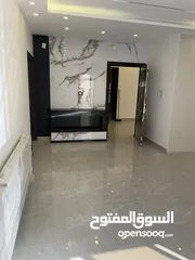  14 شقه طابق اول في احلى مناطق ضاحية الرشيد قرب دوار اقرا تشطيبات سوبر ديلوكس