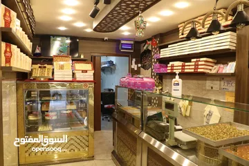  15 محل حلويات شاميه جاهز شغال بموقع مميز  بجبل الحسين للبيع بخلو وايجار ويمكن بيعه فارغا بخلو