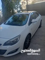  3 سياره اوبل استرا سيدان 2013