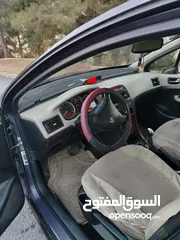  5 بيجو 307 2004