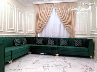  3 curtains and sofa