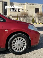  10 نيسان تيدا Nissan TIIDA 2008 هاتشباغ لون احمر مميز محرك 1600 للبيع