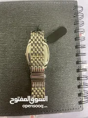  5 ساعة mark naimer يابانية ستانلس ستيل ضد الماء عقارب عادية فضية و بيضاء من الداخل و يوجد تفاصيل خضراء