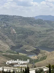  6 ارض للبيع جرش المجدل مطله على سد الملك طلال