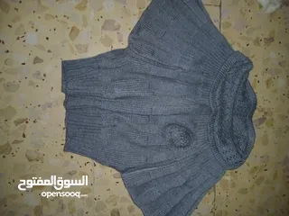  9 ملابس بيبي مع كرسي طعام