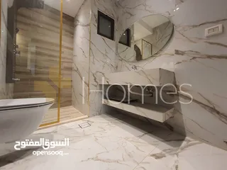  5 شقة ارضية مع ترس للبيع في حي الصحابة بمساحة بناء 237م