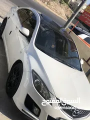  9 مازدا زووم 6 لون أبيض لؤلؤي للبيع موديل 2009