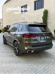  13 BMW X5 50e ترخيص   محرك 3000 هايبرد plug in/يقطع على الشحنه 100 كيلو متر