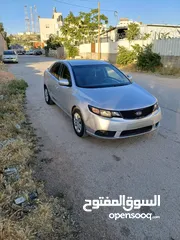  3 دفعه كيا فورتي 2009 ماتور1600 بنزين جير اوتماتيك حساسات خلفي مكيف شغال شبابيك كهر