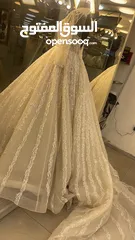  2 بدلة زفاف  من تصميم اردني