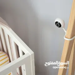  1 كاميرا متابعه الطفل وقياس  حراره  الغرفه بالصوت والصوره