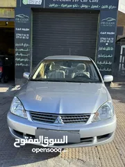  1 لانسر للبيع اقساط شخصي لون سلفر مميز 1.6 اصلي