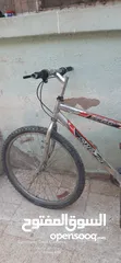  1 بسكليت جنط 26 بحالة جيدة بحاجة الى سلك برك