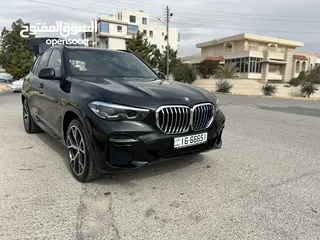  1 بي ام دبليو X5 لون اسود موديل 2022 Mكيت فل كامل فحص كامل وارد وكاله عمان