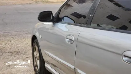  9 للبيع  كيا سبكترا 2002 - نظافة مميزة وسعر ممتاز سيارة اقتصادية ومريحة