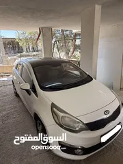  17 كيا برايد 2016 سقف اسود اتوماتيك ولا ضربه