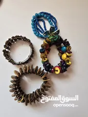  1 أساور خشب وواحدة حديد (بني أزرق ملون)