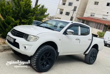  26 ميتسوبيشي L200 2011 + قطع