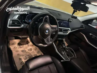  11 BMW 330e plug إن