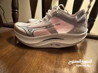  1 Mizuno WAVE REBELLION PRO2 جوتي جري احترافي