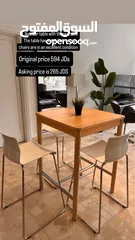  1 IKEA bar table with three stools