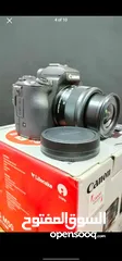  2 canon m50 with cage and adapter