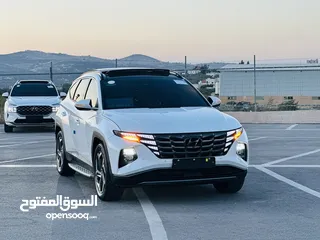  5 هونداي توسان/2024  فل الفل فتحة سقف بانوراما  2x4 ///240Hp بنزين + كهرباء  ( Haybrid) 1600cc