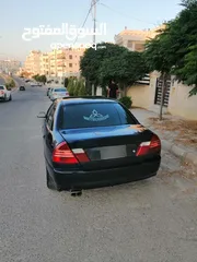  1 ميتسوبيشي لانسر موديل 1997 فل كامل ماعدا القير