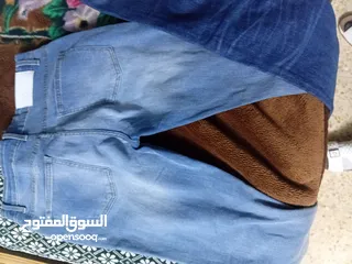  12 * شروة ألبسة جديدة مميزة بسعر مغري جدا _براندات/جينزات عدد 5 و بلايز تيشرتات عدد 5جديدة .اقرا الوصف