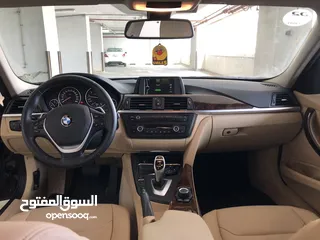  7 BMW320i 2014 Gcc full opinion without sunroof original paint first owner