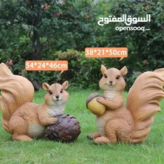  3 تمثال السنجاب  بالحجم الكبير يتوفر التمثال في وضعيتين مميزتين: سنجاب جالس بشكل لطيف