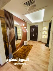  21 For sale in Ajman, in Horizon Towers Ajman, the most elegant and elegant, two rooms and a hall, over