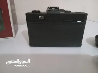  4 كاميرا فوتوغراف ( فيلم ) جديدة بكرتونتها